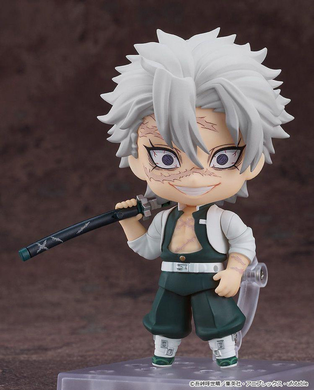 Angry expression with clenched teeth, holding sword in mid-swing pose