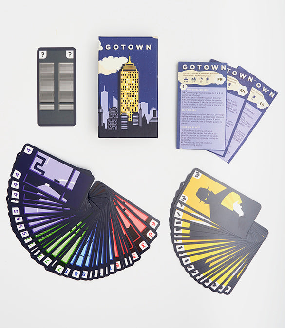 Gotown card game set with a box rule cards in English, French and Spanish two decks of player cards fanned out
