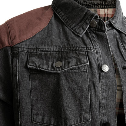 Dark grey denim jacket with brown shoulder patches, a chest pocket, and unique metal buttons over a plaid shirt
