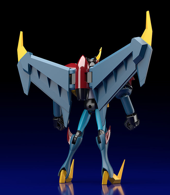 Back view of a blue and red Mecha robot action figure with large blue wings and yellow accents
