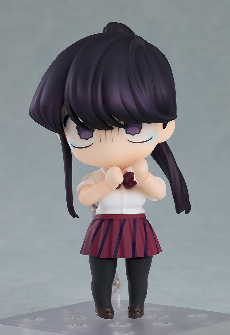 Rear view of Komi Nendoroid highlighting ponytail and pleated skirt design