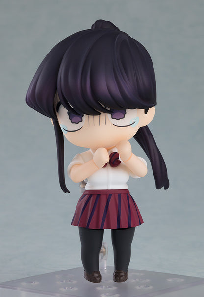 Rear view of Komi Nendoroid highlighting ponytail and pleated skirt design