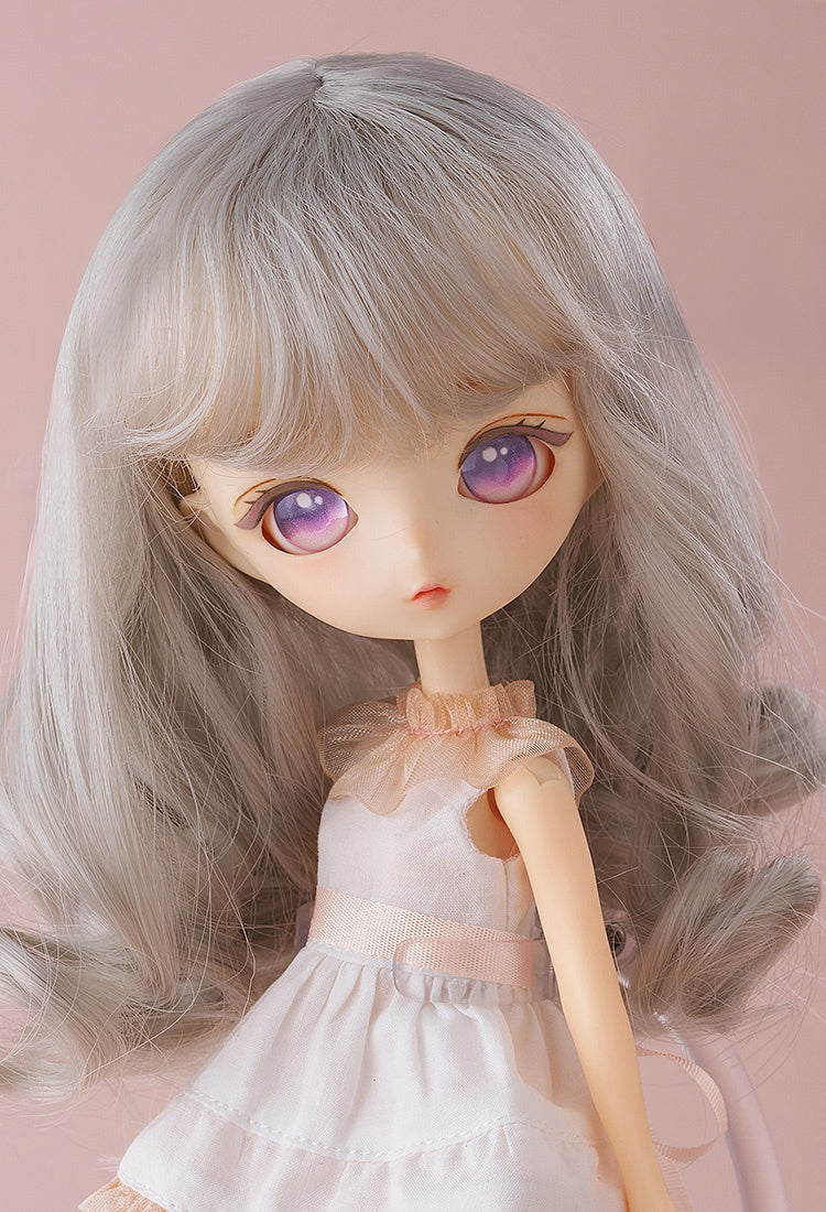 Rear view of Mellow doll showcasing wavy hair and soft color palette