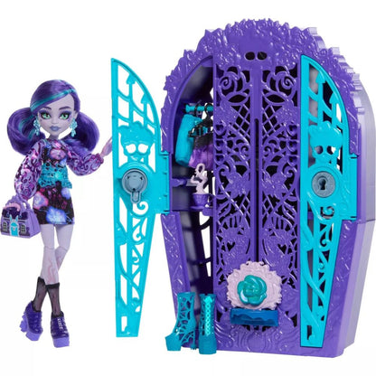 Monster High Twyla doll with purple pigtails, standing next to an open purple coffin-shaped closet playset with teal doors, showing clothes and accessories