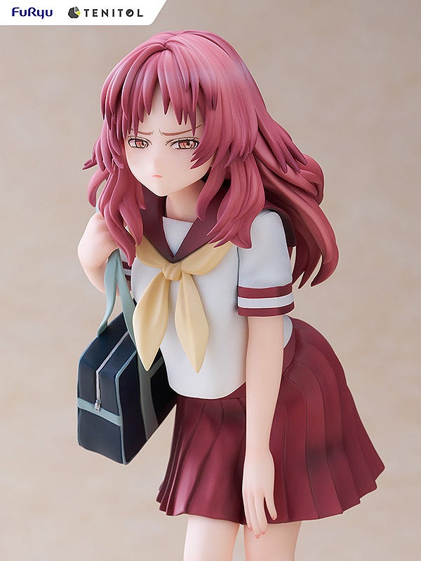 Ai Mie figure sitting on desk with thoughtful pose