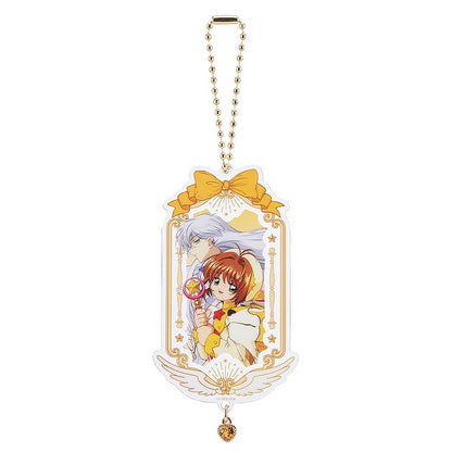 Cardcaptor Sakura 25th Anniversary acrylic keychain featuring Sakura and Yukito with a bow design