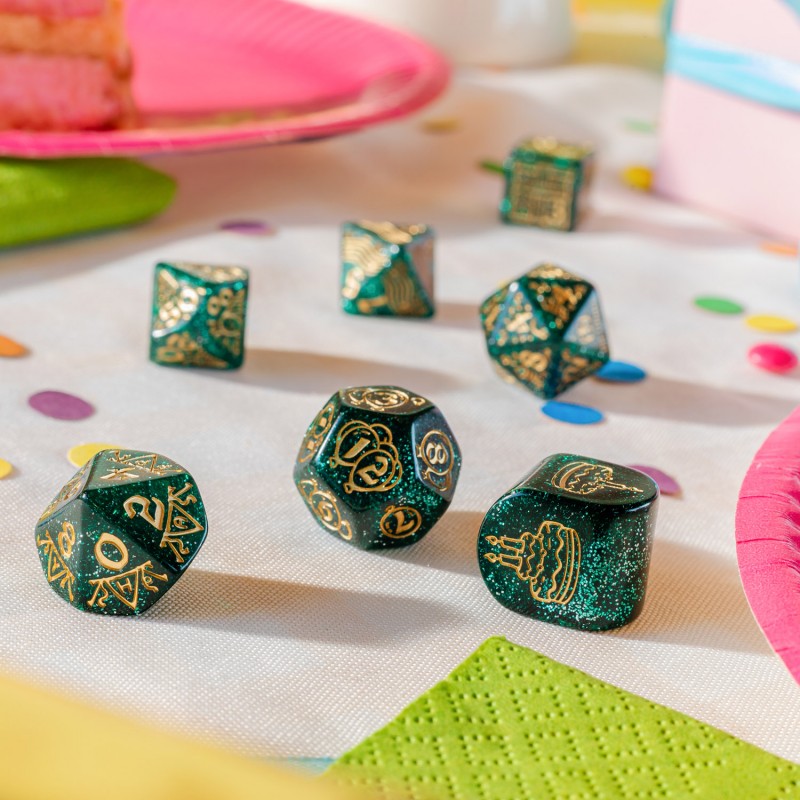 Third view showing different dices of Q Workshop’s Happy Birthday D7 Dice Set Balloons sitting on table