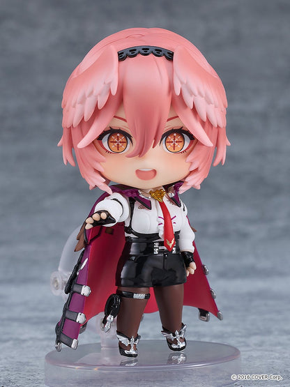 Chibi anime figure with pink hair red eyes white shirt black shorts and a red cape