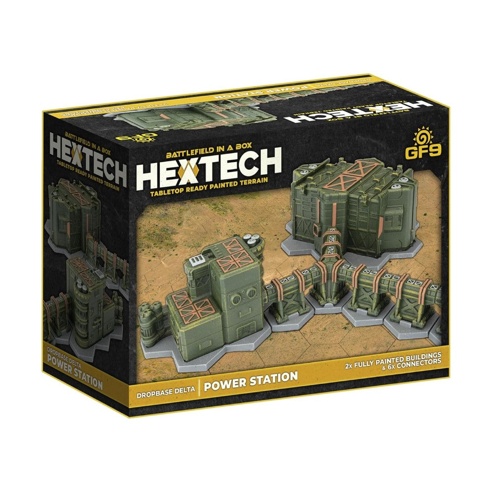 Hextech Power Station tabletop terrain box shows two olive-green sci-fi buildings and connectors on a sandy base.