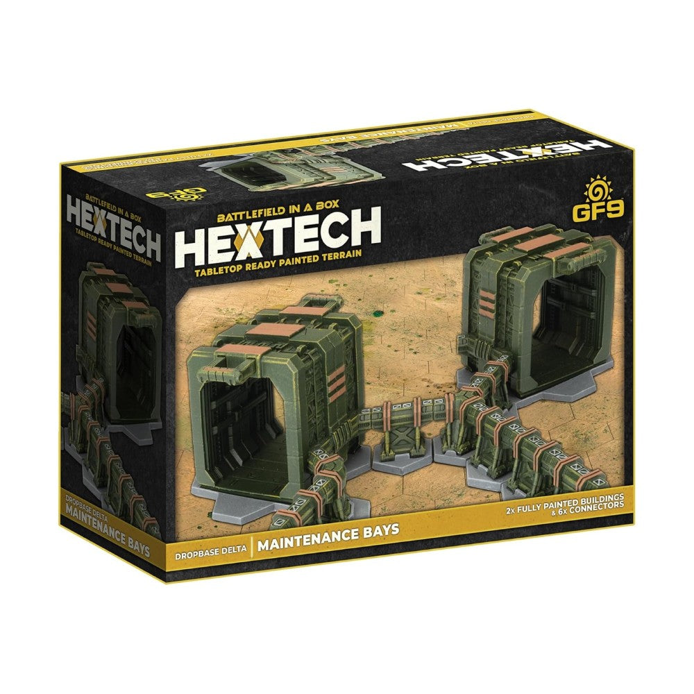 Hextech 'Dropbase Delta Maintenance Bays' product box. Displays two green sci-fi buildings linked by walkways on tabletop terrain.