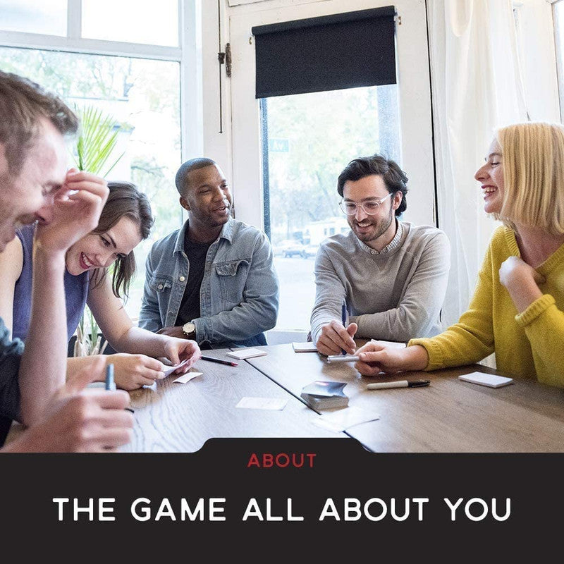 Group of friends playing the About The Game All About You card game around a wooden table