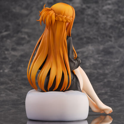 Close-up side view highlighting the relaxed pose and intricate hair sculpt