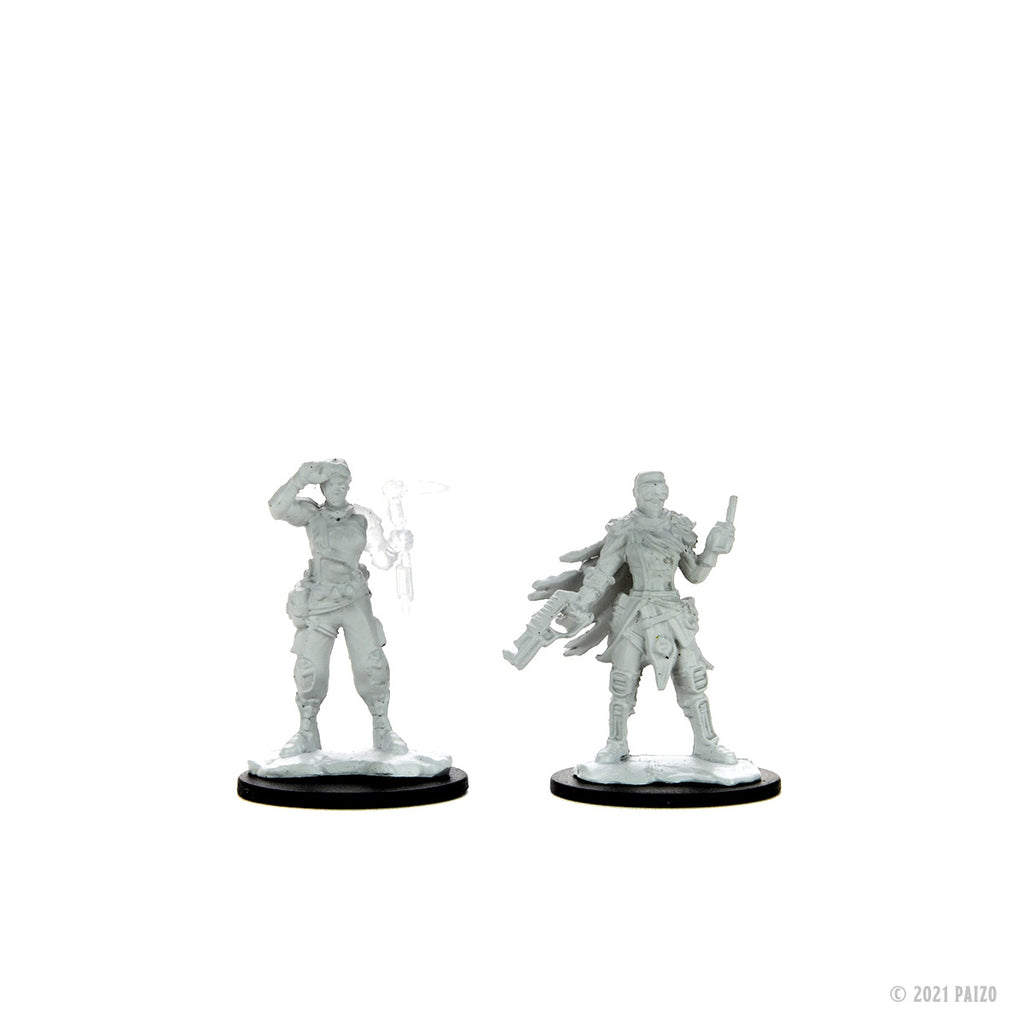 Two Grey sci-fi miniatures: A woman saluting, and a man with a rifle and pistol