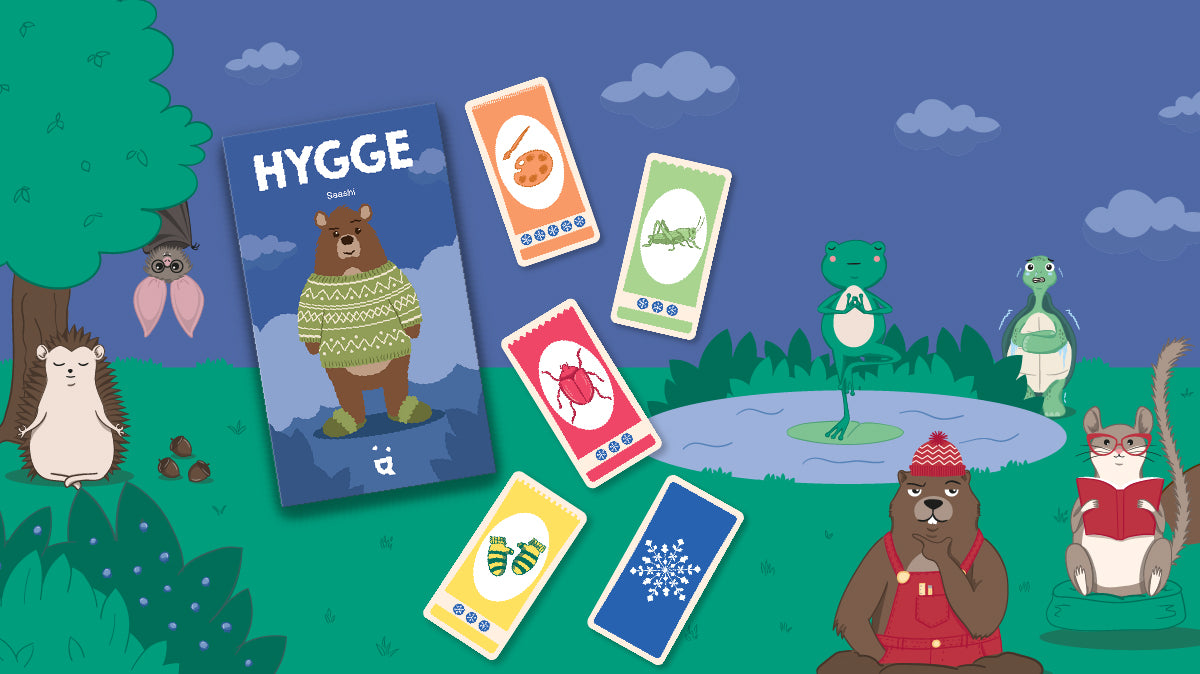 Close-up of hands holding cards from Helvetiq Hygge Card Game for 2-4 Players