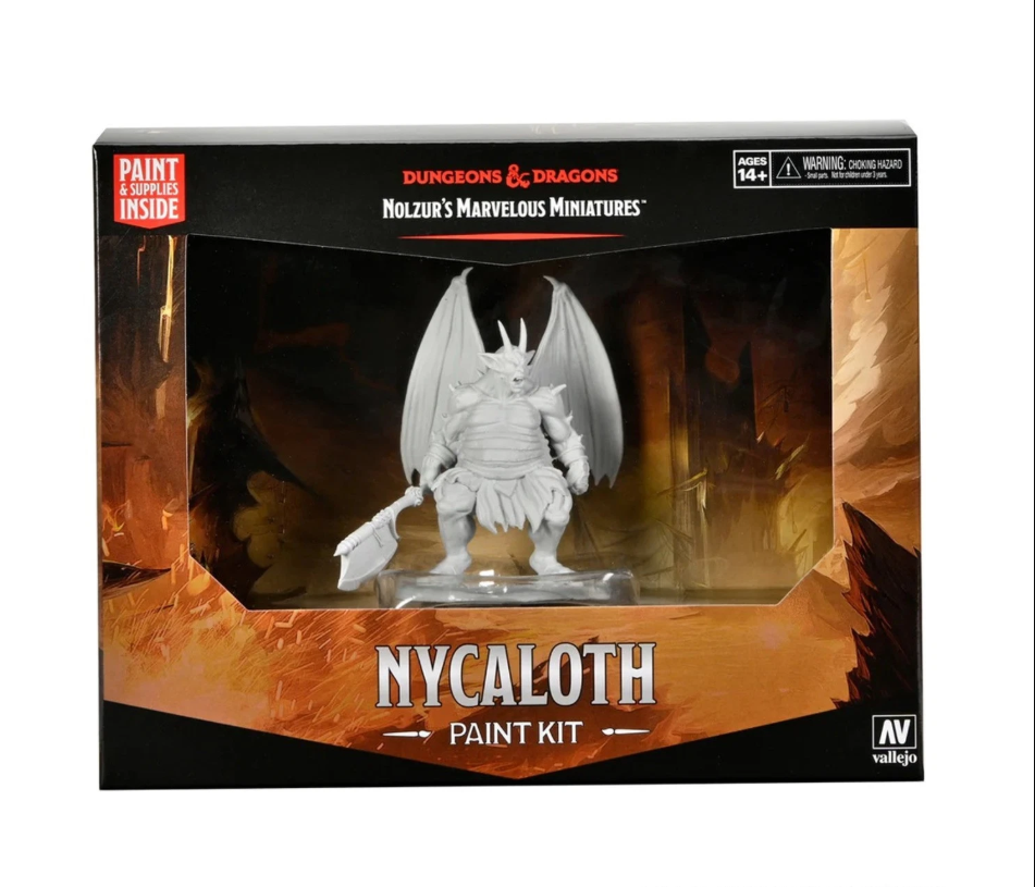 D&D Nycaloth paint kit with a gray, unpainted winged demon miniature holding an axe inside its box