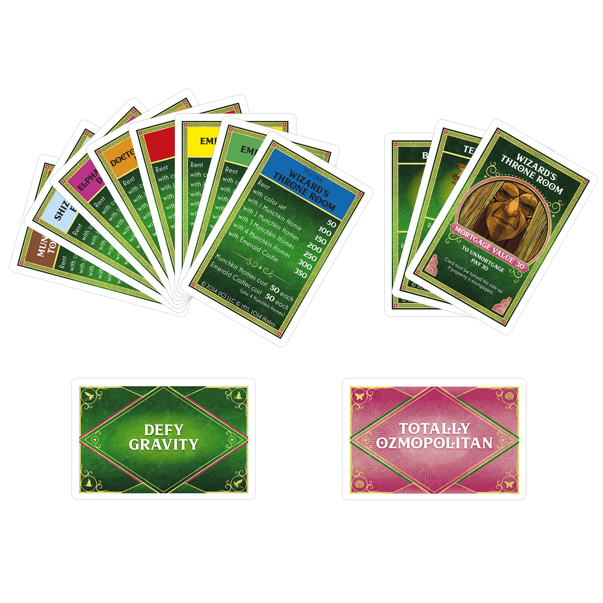 A collection of Monopoly-style Wizard of Oz game cards, including two fanned stacks of property deeds and two action cards below