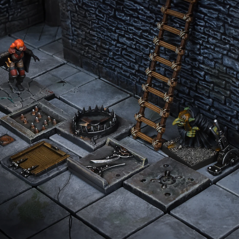 Dungeon floor with tabletop miniatures: a red-haired hero, a goblin, various floor traps, a rope ladder, and stone walls