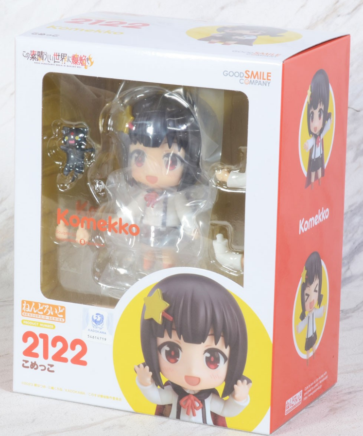 A boxed Nendoroid figure of Komekko showing the figure inside the clear plastic packaging