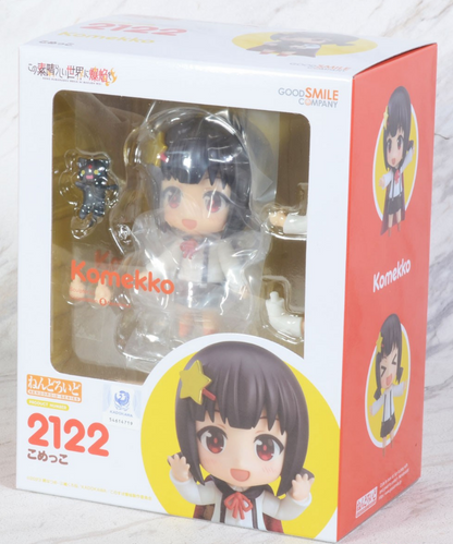 A boxed Nendoroid figure of Komekko showing the figure inside the clear plastic packaging