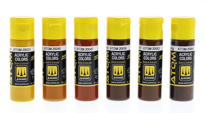 Six AMMO ATOM acrylic paint bottles in brown and earth tones, each with a yellow cap, lined up