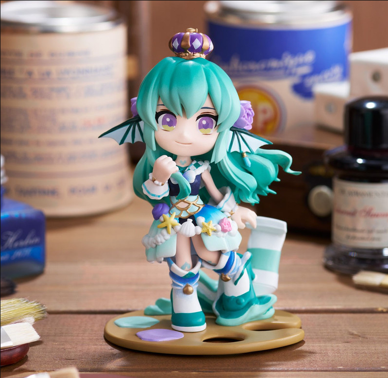 Nendoroid figure of Mori Calliope in colorful mermaid-style outfit with crown and paint palette base on color backgrond