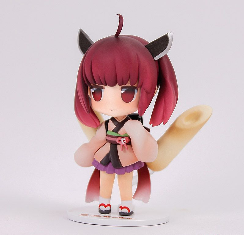 Chibi anime girl figure featuring reddish-brown hair animal ears and a fox tail