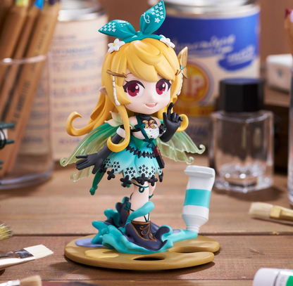 Colorful anime-style figure of a blonde character with wings holding up a finger standing on a gold palette with a blue paint tube on color backgrond