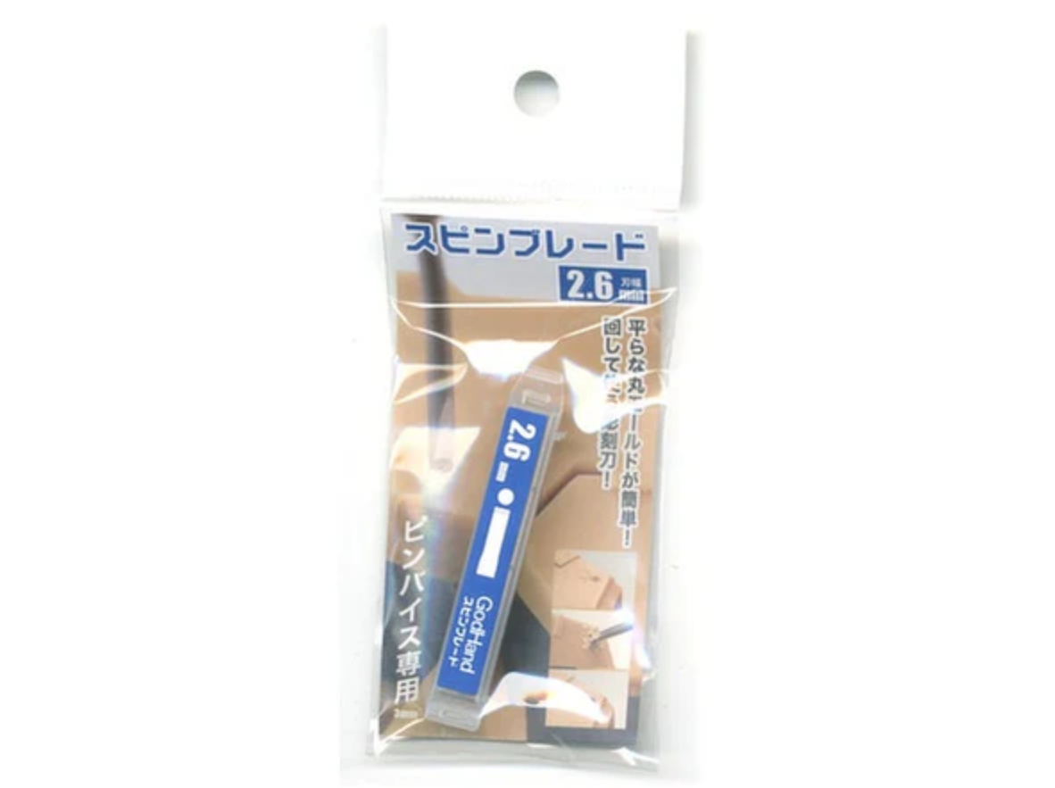 A GodHand  2.6mm Spin Blade for pin vise, in clear package with Japanese text and carving examples