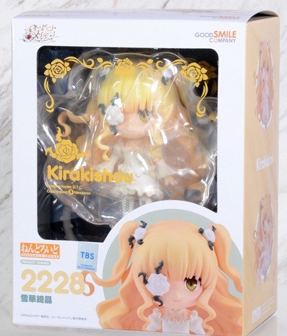 Nendoroid Kirakishou Rozen Maiden doll in a white dress blonde hair and rose accents inside its display box