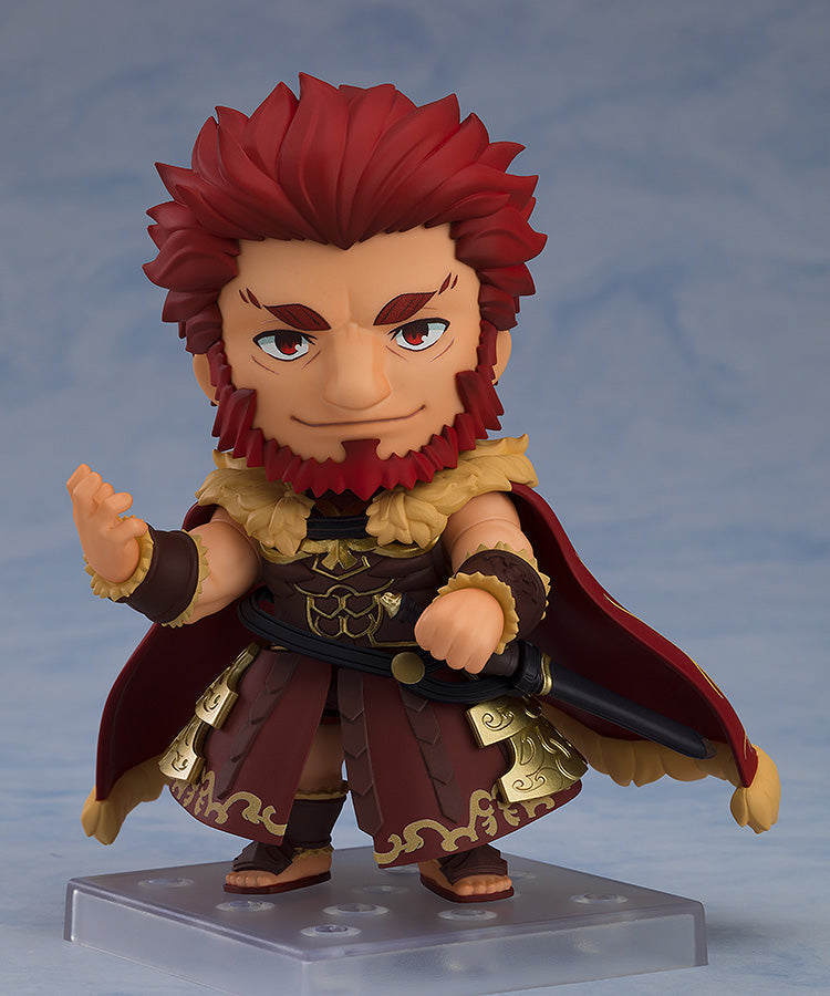 Good Smile Company Nendoroid RiderIskandar DX Edition figure This anime collectible features the character in a maroon and gold outfit with a red cape holding a sword