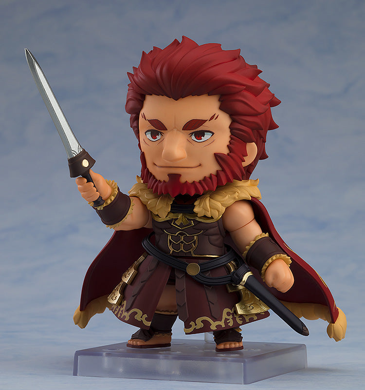 Nendoroid Rider Iskandar figure from FateGrand Order holding a sword featuring intricate red and gold armor details on a clear display stand