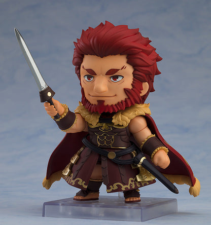 Nendoroid Rider Iskandar figure from FateGrand Order holding a sword featuring intricate red and gold armor details on a clear display stand