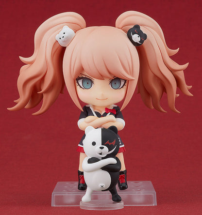 Danganronpa Nendoroid Junko Enoshima figure 20576 featuring blonde pigtails with white and black Monokuma hair clips holding a Monokuma plushie on a clear stand