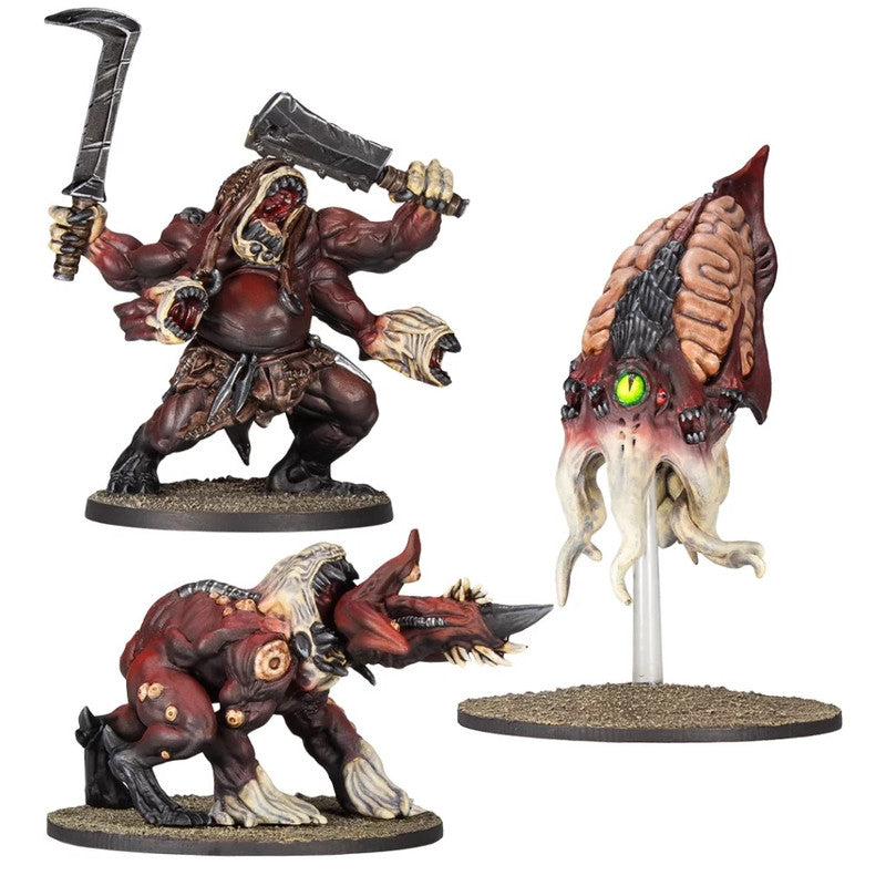 Three detailed grotesque monster miniatures: a four-armed creature with weapons, a horned beast, and a floating tentacled brain