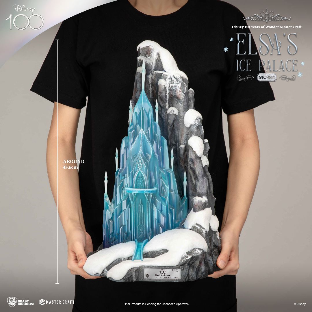Disney 100 Years of Wonder Master Craft Elsa's Ice Palace statue by Beast Kingdom depicting a tall icy blue castle nestled in snowy grey mountains held by hands