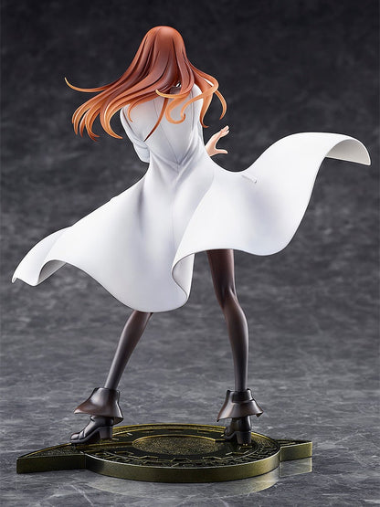 Back view of a female anime figurine with flowing brown hair, a white coat billowing around her, standing dynamically on an ornate gold base