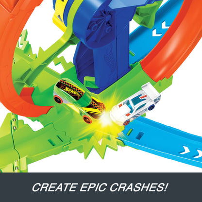 Hot Wheels cars crashing on a vibrant multi-colored track set with an impact flash