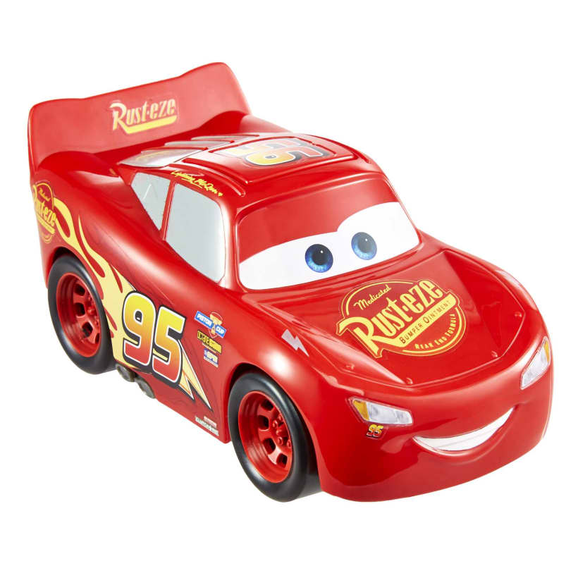 Red Lightning McQueen toy car, smiling, with blue eyes, number 95, and Rust-eze logo