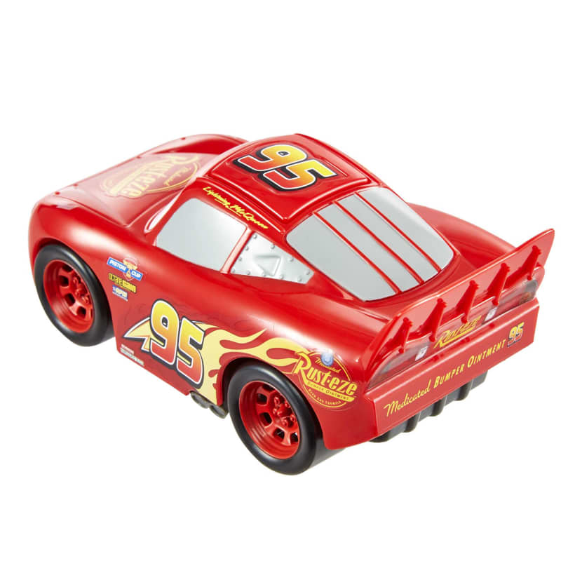 Red Lightning McQueen race car with number 95, yellow flames, and a spoiler, seen from the back-right