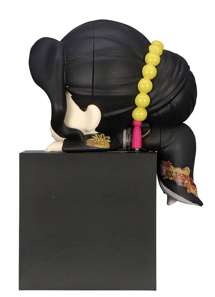 Side view of Mitsuya figure with visible Tokyo Revengers logo on jacket