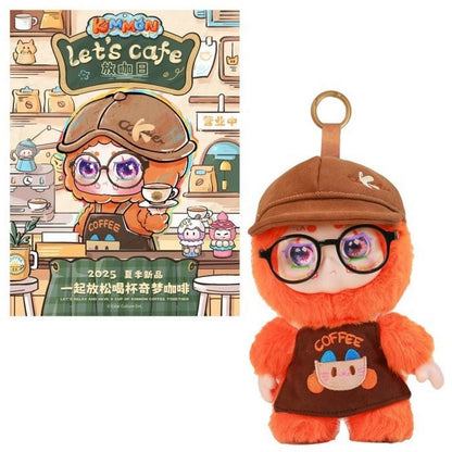 Orange furry plush barista doll (wearing glasses, cap, and apron) displayed with its "Let's Cafe" promotional art