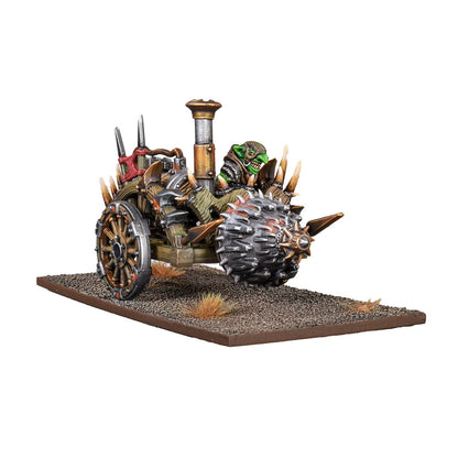 Miniature of a green goblin driving a spiky, armored war vehicle with a front roller and a rear wheel