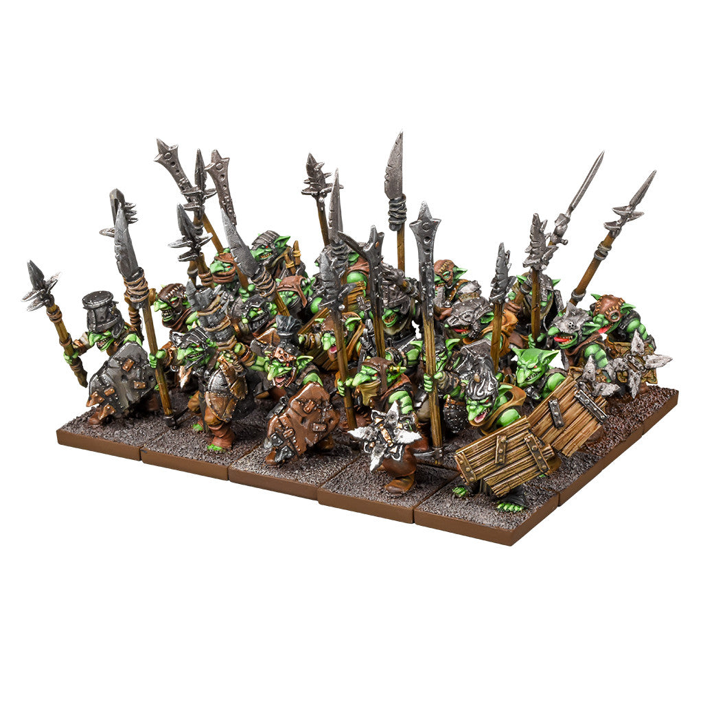 A battle formation of armored green goblin miniatures wielding spears and shields