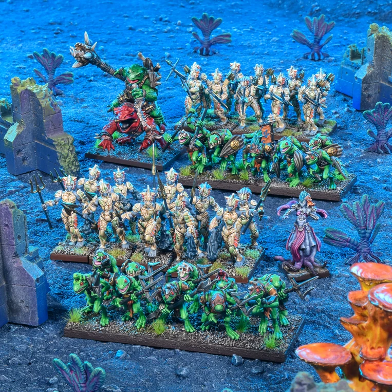 Kings of War Trident Realm Army painted miniatures on base in blue water terrain