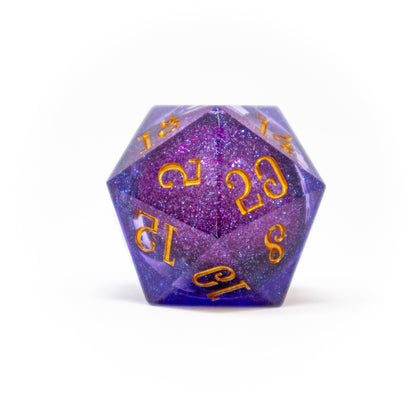 A shimmering purple and blue glitter d20 with gold numbers, centered on a white background