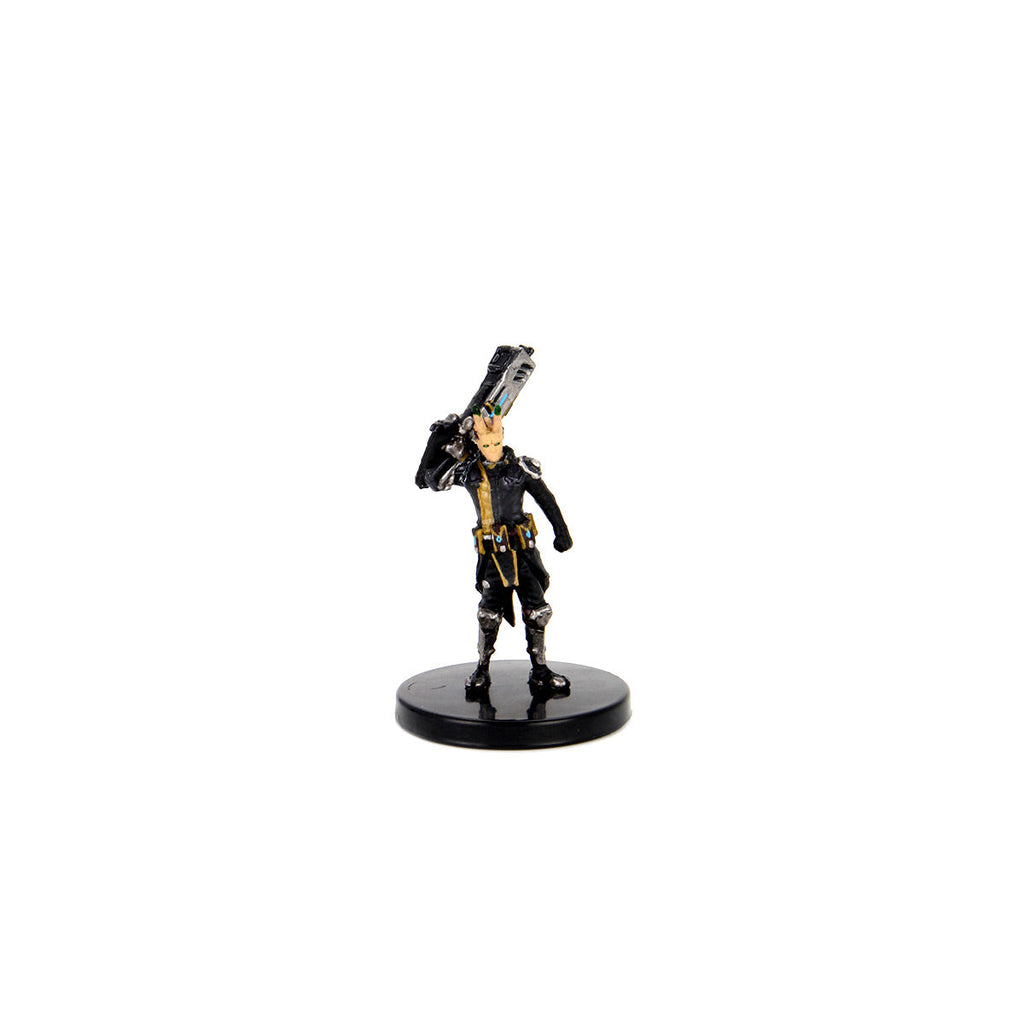 A sci-fi male miniature in a black and gold uniform, shouldering a large futuristic rifle, on a black base