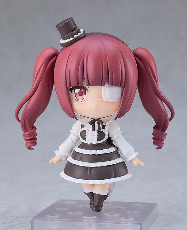 Yurine Hanazono smirking while holding a spellbook