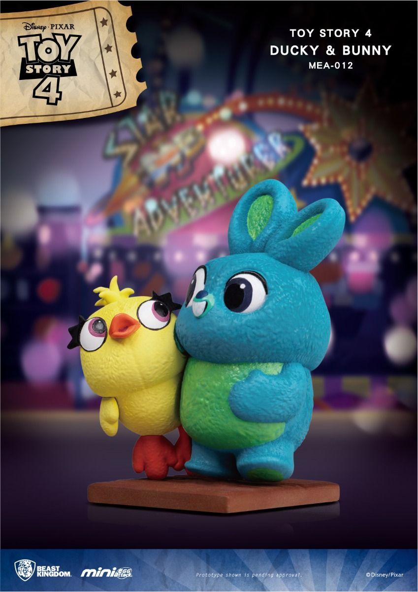 Toy Story 4 Ducky and Bunny action figures on a dark blue surface