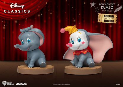 Two Disney Classics Dumbo figurines one gray and one with a pink nose and yellow hat sit on wooden bases