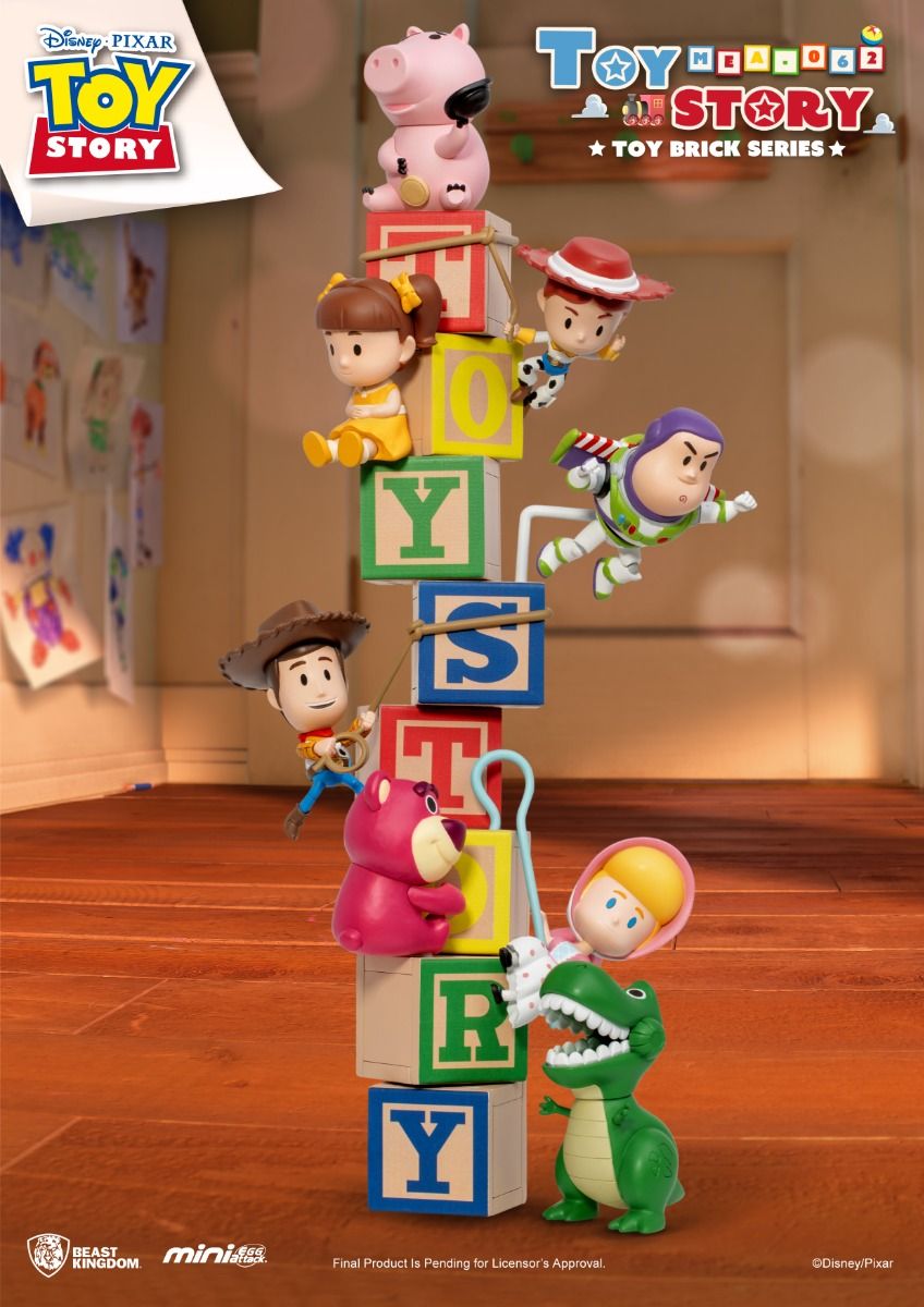 Toy Story characters climb and pose on stacked wooden blocks spelling &#39;TOY STORY&#39;